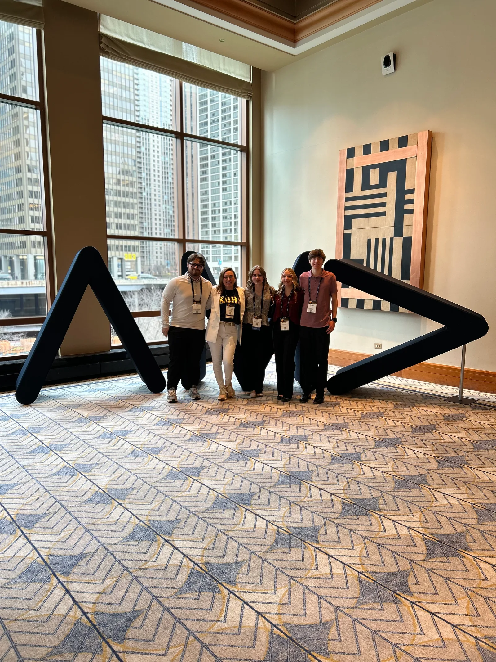 A tall American Marketing Association display inside the conference venue.