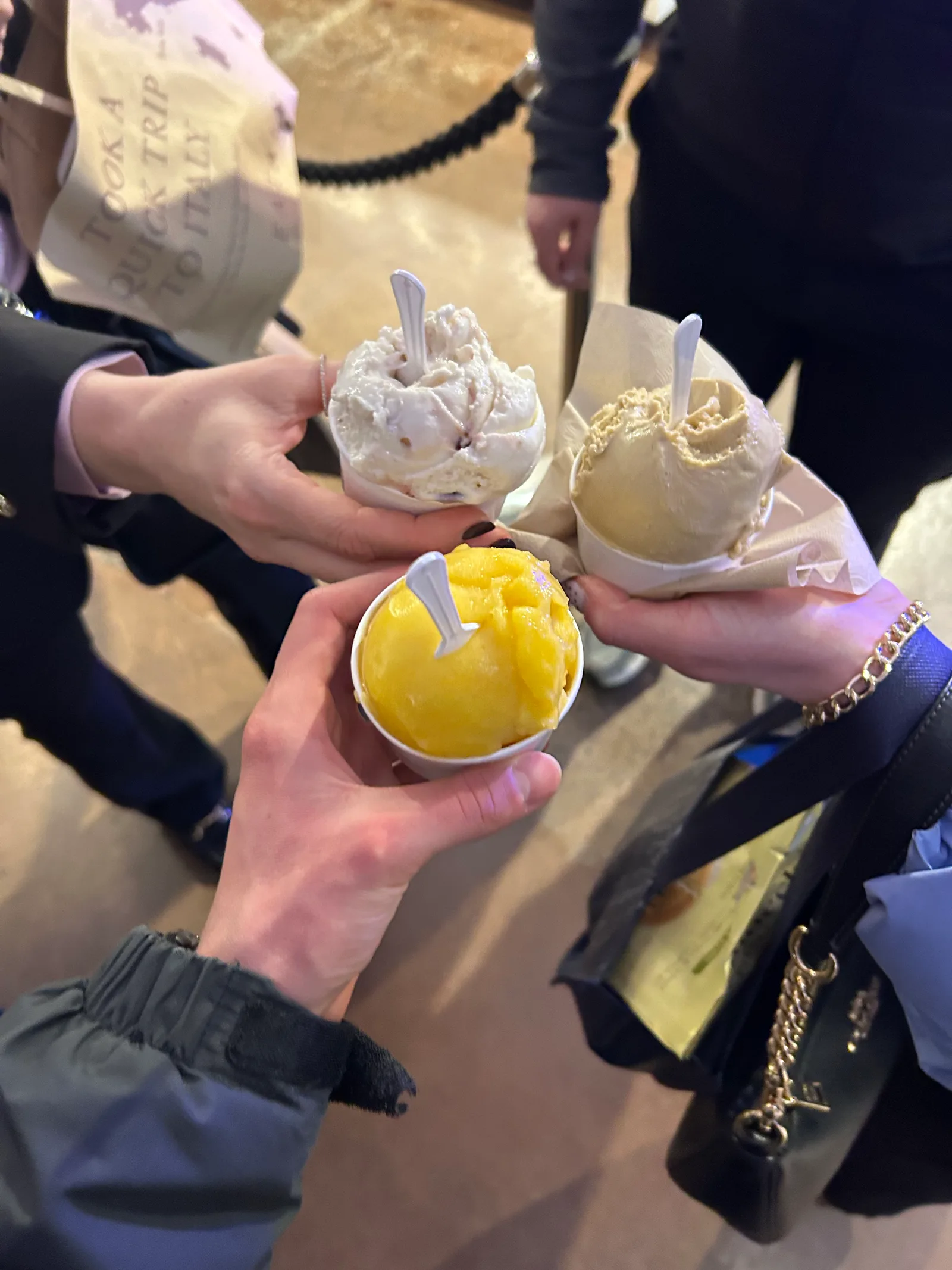 A cup of gelato held up during an evening stop in Chicago.